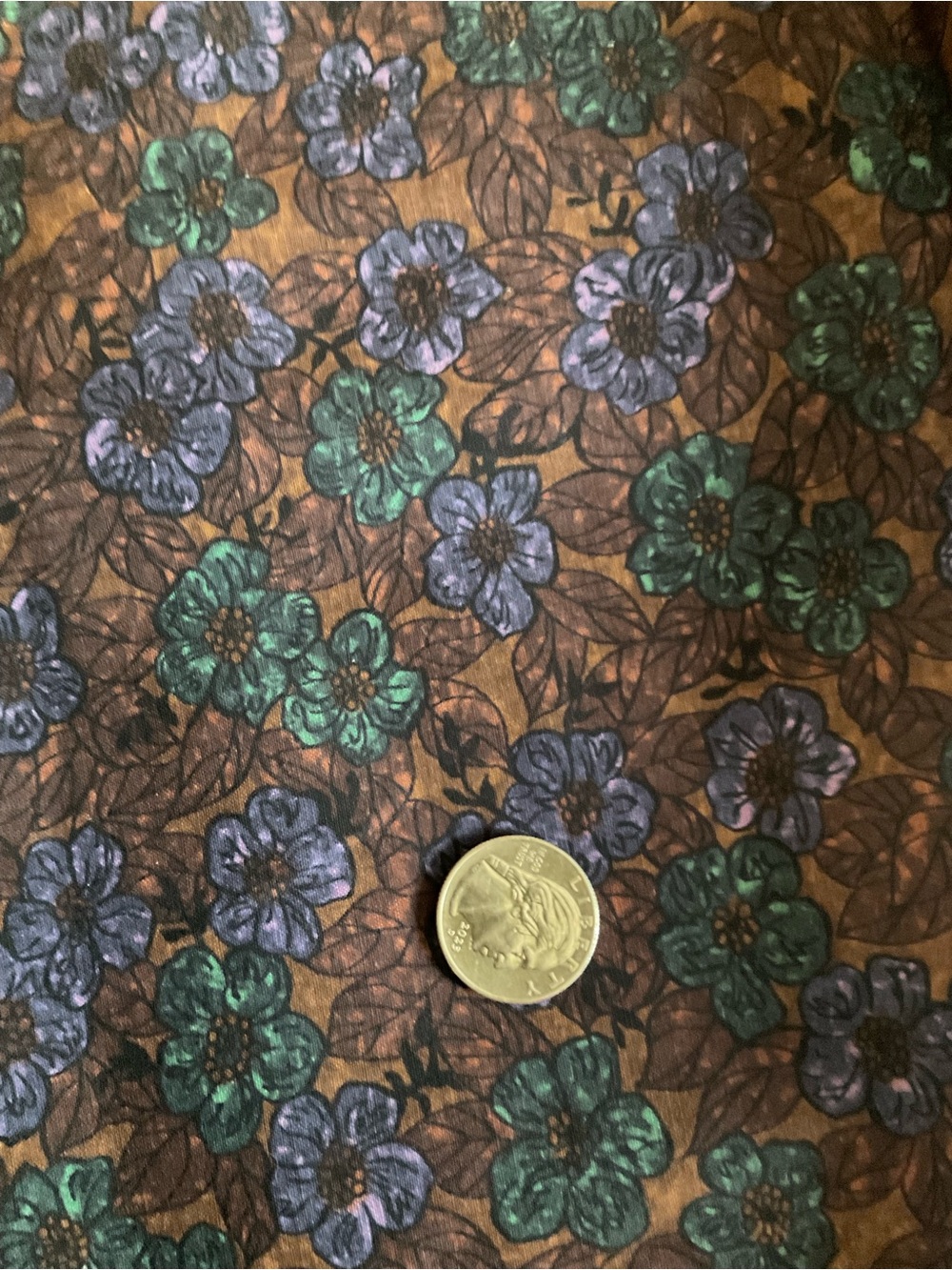 Vintage Fabric 1960s Floral Print inTeal & Lavender on brown background